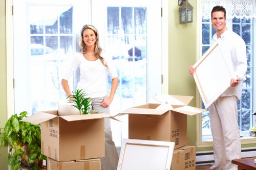 Professional movers handling a flat relocation in Brixton