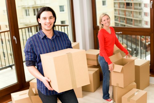 Local movers handling boxes and furniture in Brixton